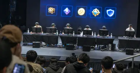 Esports players compete as fans follow a digital reward challenge.
