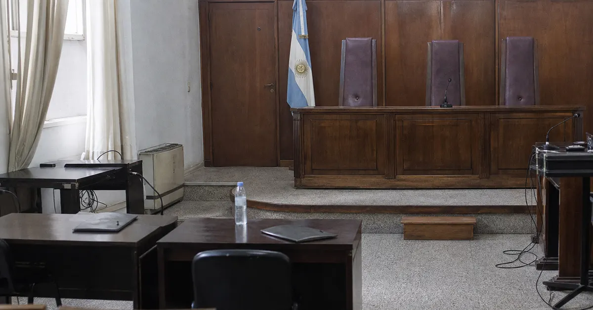 An empty courtroom prepared for a verdict in a high-profile football-related trial
