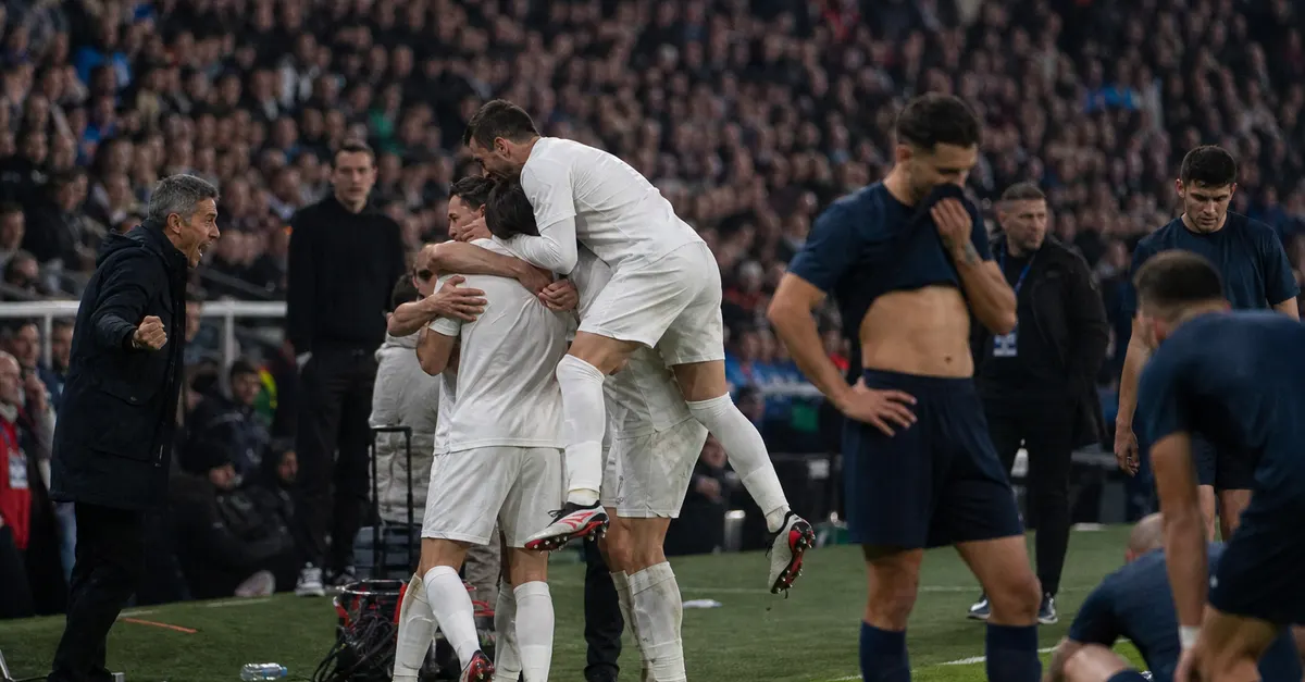 Anonymous footballers celebrate while their opponents regroup after a tense match.