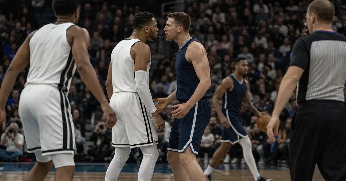 Anonymous basketball players exchange words during a professional game